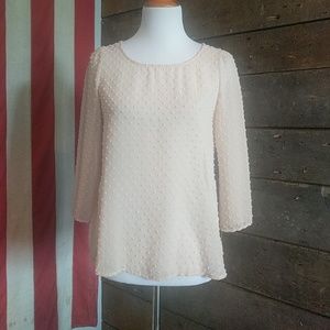 Light pink/peach blouse